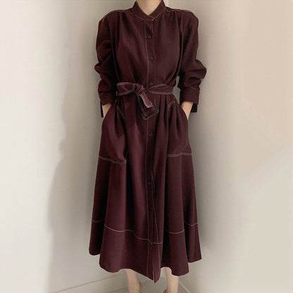 Vestido cortavientos de tejido, de manga larga, con cuello alzado y cierre de botonadura sencilla, estilo coreano
