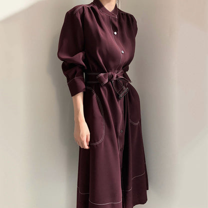 Vestido cortavientos de tejido, de manga larga, con cuello alzado y cierre de botonadura sencilla, estilo coreano