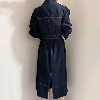 Vestido cortavientos de tejido, de manga larga, con cuello alzado y cierre de botonadura sencilla, estilo coreano
